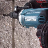 Ударная дрель Makita HP1631